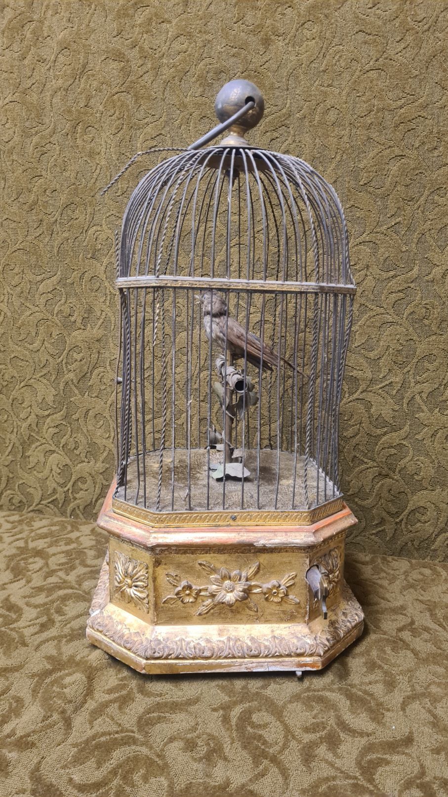 A singing bird cage automaton